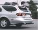 1999 Ford Taurus - This silver 1999 Ford Taurus wagon features a rear spoiler and dual exhaust pipes.