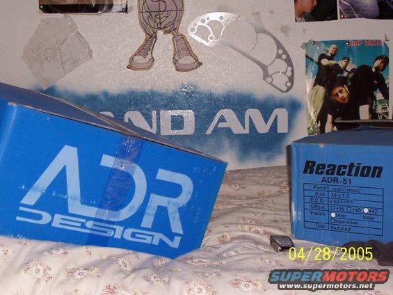Two blue boxes for car wheels, one labeled ADR DESIGN, the other Reaction ADR-51. A date stamp reads 04/28/2005