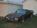 1972 Ford Ranchero - This 1972 Ford Ranchero is parked in front of a building on a cloudy day.