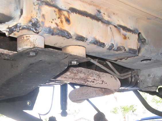 Underbody view of suspension components and welded frame sections