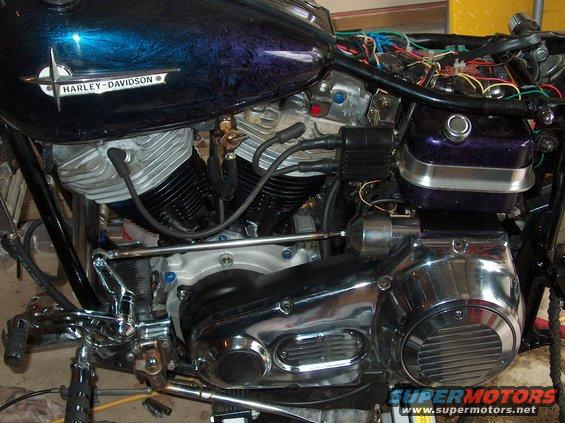 1976 Harley-Davidson Super Glide engine with blue and purple tank, chrome accents, and exposed wiring