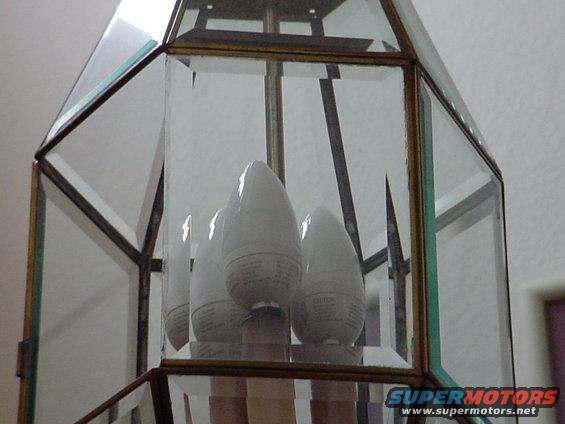 dsc00178.jpg Some of the compacts can get really compacted!  Here is a mini compact.  has the 1/2 inch screw in base and uses 4 watts of electricty but puts out about 20 watts of light.  