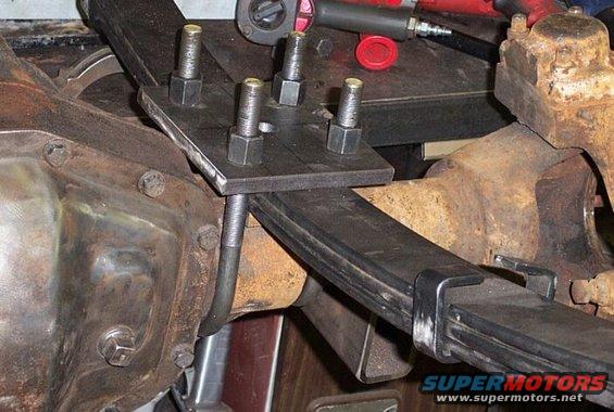 Custom driver's side spring plate using 1/2" plate.  U-bolt bends are  3.75" and 3.125"