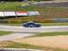1965 Ford Mustang - Completing 10A at Road Atlanta and setting up for 10B. May 1, 2005 at the 28th annual Walter Mitty Challenge.