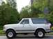 1988 Ford Bronco - This 1988 Ford Bronco is seen from the side, its FX4 badging and black removable top.