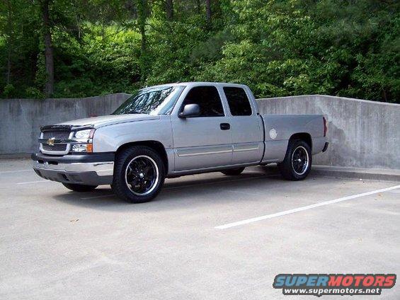 Silver 2004 Chevrolet Silverado 1500 pickup truck parked in a lot