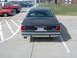 1990 Ford Crown Victoria - This 1990 Ford Crown Victoria is seen from the rear, dual exhaust pipes and a clean body style.