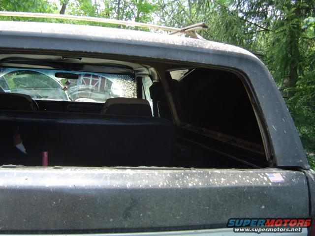 Rear interior of a 1979 Ford Bronco, showing seats and cargo area