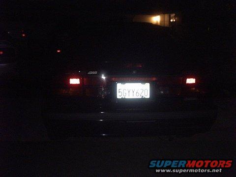 Car rear with license plate 5GYY620 illuminated at night
