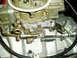 1966 Ford Fairlane - Carburetor linkage detail showing throttle cable and return spring mechanism.
