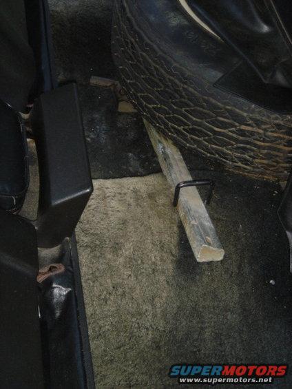 Spare tire and jack in cargo area