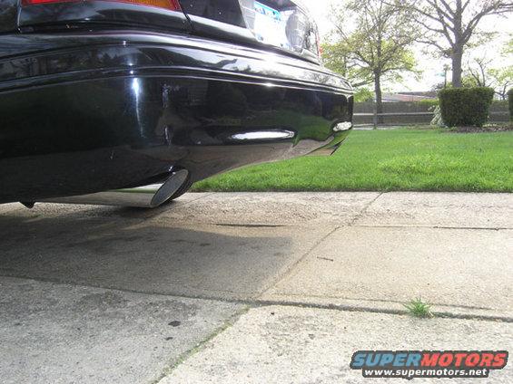 1999 Ford Crown Victoria rear bumper with exhaust pipe visible