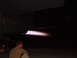 1988 Ford Bronco - The intense glow of an afterburner ignites, illuminating the dark surroundings as a person observes.