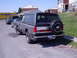 1987 Ford Bronco - This Ford Bronco is parked on a residential street next to other vehicles, including a Pensky truck.