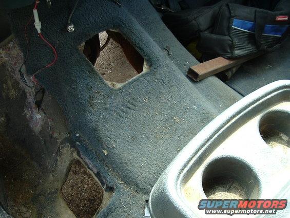 dscf0043.jpg Holes in the floor. lol For now ;) Had to removed tranny and t-case