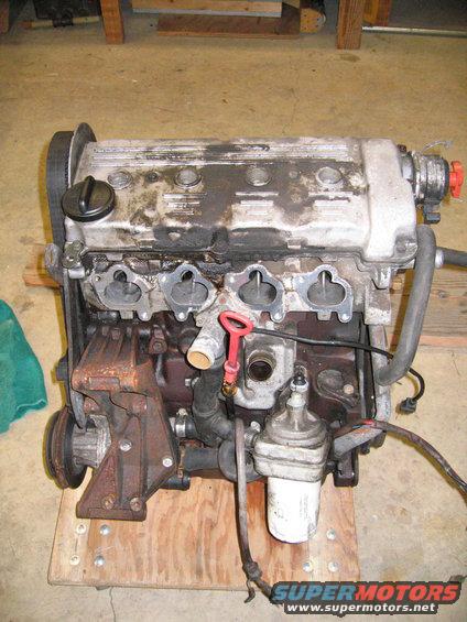 Engine with oil filter and belt pulley