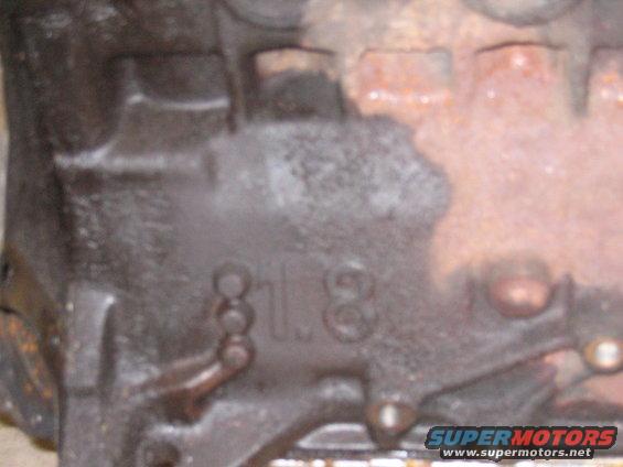 Engine block casting showing "1.8" designation