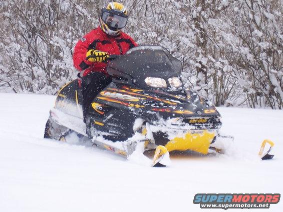 2002 Ski-Doo MX Z 500 Sport snowmobile with rider in snow