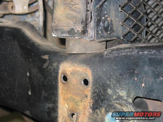 relocatedbodymount.jpg The new body mount sits on top of the frame. There is less beef in the radiator support now, time will tell if this was a good move.