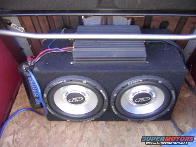 Dual P&D Octane subwoofers with amplifier and capacitor