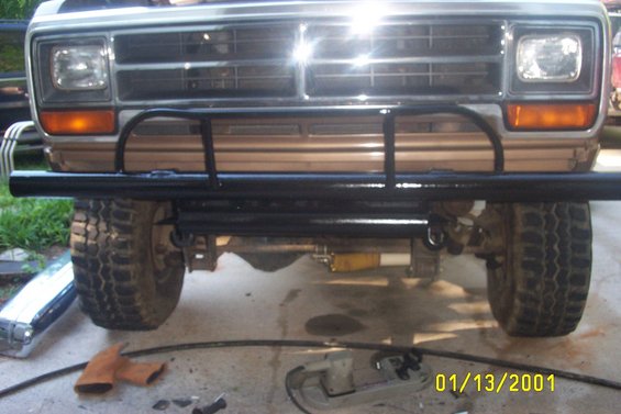 Front view of a truck with a black bull bar and large tires. Date stamp reads 01/13/2001