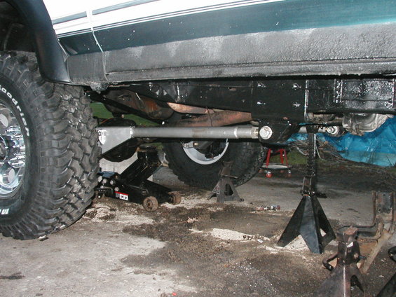 1994 Ford Bronco rear axle assembly on jack stands, with BFGoodrich tires