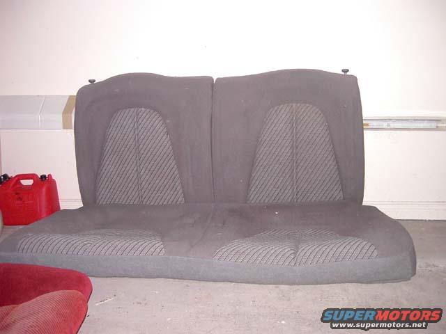 Rear car seat with patterned fabric inserts