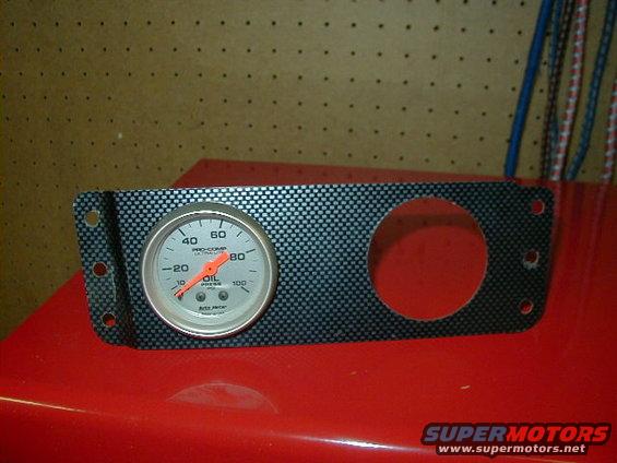 gauge cluster with oil pressure gauge and empty cutout