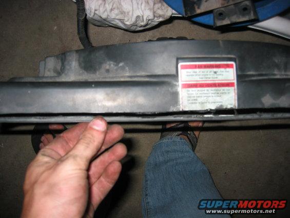 img_0670.jpg Not content to use the smaller Taurus fan, I decided to cut a little bit of the shroud off the T-bird fan. It had about 1 inch between the fan and the edges of the fan shroud, so cutting about a half inch seemed to be ok.