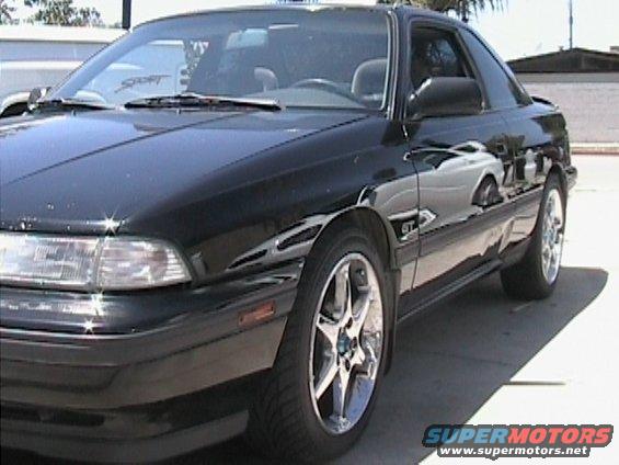 Black 1989 Mazda MX-6 GT coupe, 3/4 front view