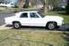 1991 Ford Crown Victoria LTD - This 1991 Ford Crown Victoria LTD is seen from the side in a suburban driveway.