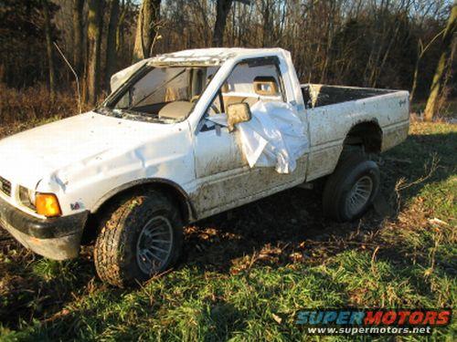 92 isuzu after it was rolled, ramped, and a few encounters with some trees