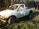 1979 Ford F-150 - 92 isuzu after it was rolled, ramped, and a few encounters with some trees