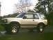 1991 Mazda Navajo - This 1991 Mazda Navajo is shown from the side, lifted with aftermarket wheels and parked outdoors.