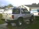 1991 Mazda Navajo - This 1991 Mazda Navajo is shown in a 3/4 front view, a lifted suspension and a second vehicle in the background.