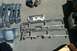 1991 Ford Crown Victoria LTD - Various dashboard trim pieces and an instrument cluster are displayed on the ground, likely for sale.