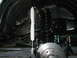 1994 Ford Bronco - Vehicle suspension components including a shock absorber and coil spring are visible.