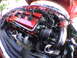 1997 Ford Probe - Close-up view of a car's engine bay, showing various components and wiring.