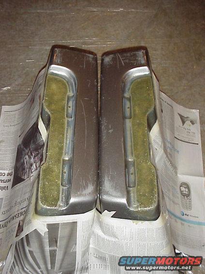 bags come with a channel for a bar mount.
cut inside bottoms flat with the braket mounting channel and glass the hole flat across.
cardboard and tinfoil can do wonders with fiberglass.
