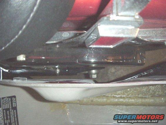 clearswingarm.jpg pay very close attention to the clearance for the softail swing arm.  it would be a real drag to do all this work and then have a pothole send that bolt up and into that fiberglass bag.