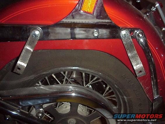 fin_brackets.jpg once the bags are properly set into the bottom, whip up some upper brackets to hang off the rear strut and seriously stabalize those bags. I used some metal strips and bent them to the exact specs I needed. Your bikes may differ, but you get the idea.