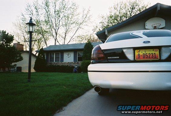 White 2000 Ford Crown Victoria rear with Nebraska license plate 9-D5231