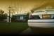 2000 Ford Crown Victoria - A white sedan is parked in front of a house on a sunny day. The license plate is visible.