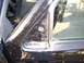 2003 Ford Ranger - Close-up view of the interior door frame, revealing mounting points and a speaker.