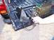 2003 Ford Ranger - Two side mirrors are laid out in the bed of a black pickup truck next to a green ammo can filled with tools.