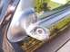 2003 Ford Ranger - The mounting bracket for the side mirror is broken and detached from the door.