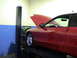 1997 Ford Probe - This 1997 Ford Probe is positioned on a lift with its hood open, ready for inspection or dyno testing.