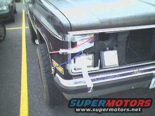 Crazy, just crazy!  This Blazer has no front end!  The headlights are all held in place with CLEAR PACKING TAPE and a BUNGEE CORD!  The right turn signal is just sitting in place!
