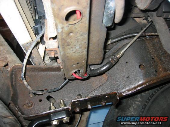 img_0693.jpg This is where I routed the wires for the fan. Gonna put split hose on it when I get around to it.
