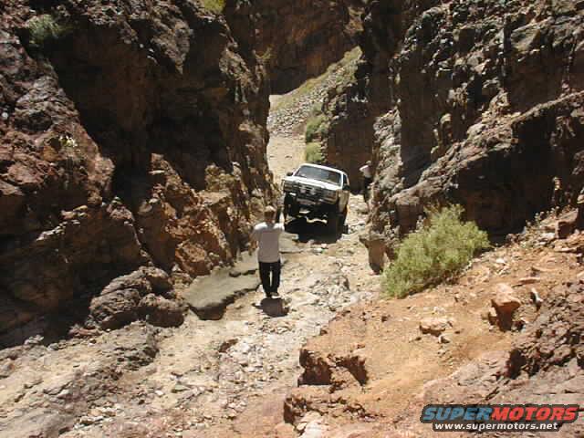 1997 Ford Ranger 3q-front view driving through a rocky canyon